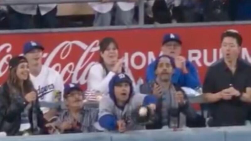 Fan interferes with deep Yankees fly ball in World Series controversy