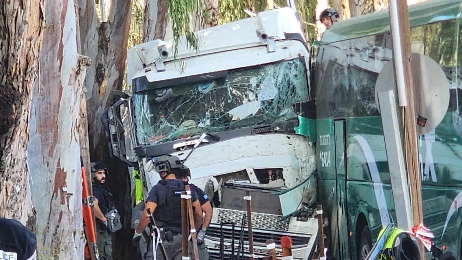 Truck rams bus stop by Israeli army base in possible terror attack, dozens hurt