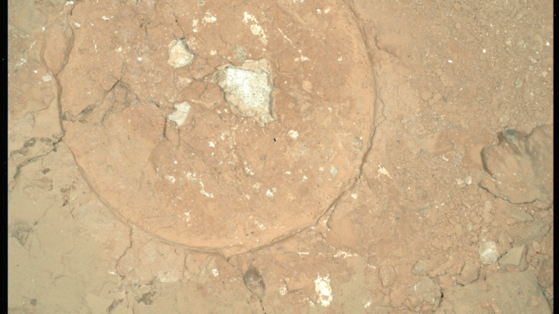 Red Rocks with Green Spots at ‘Serpentine Rapids’