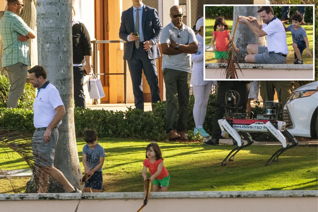 JD Vance plays with his kids as robot dog Spot stands guard at Mar-a-Lago