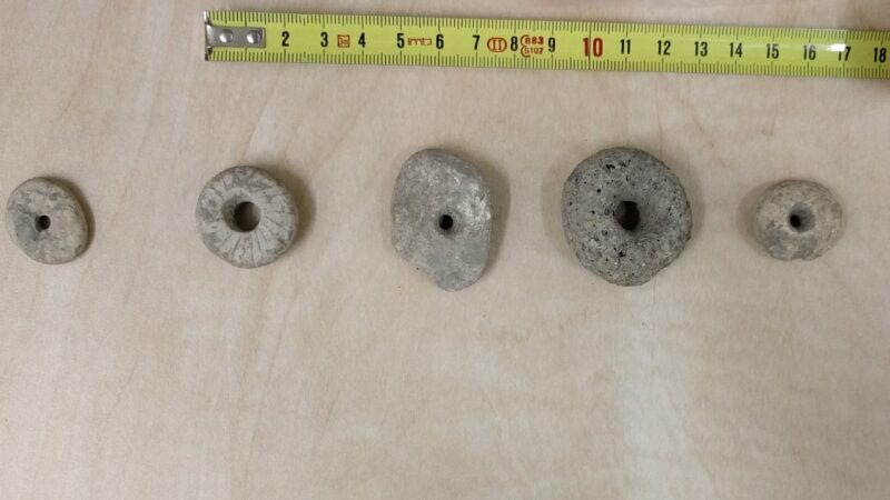 Over 100 perforated stones found in Israel suggested to be ancient spindle whorls in new research