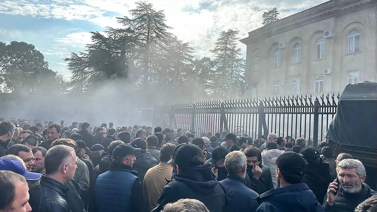 Protestors storm Putin-backed parliament in Georgia breakaway region