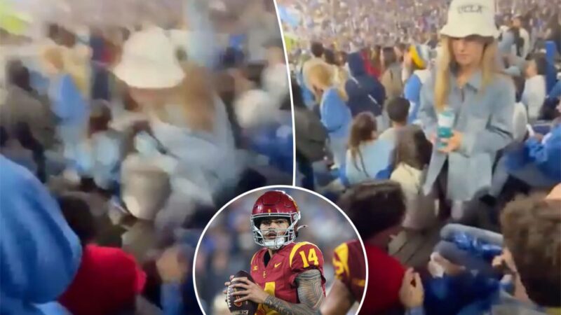 UCLA fan viciously smacks USC fan in the face during rivalry game