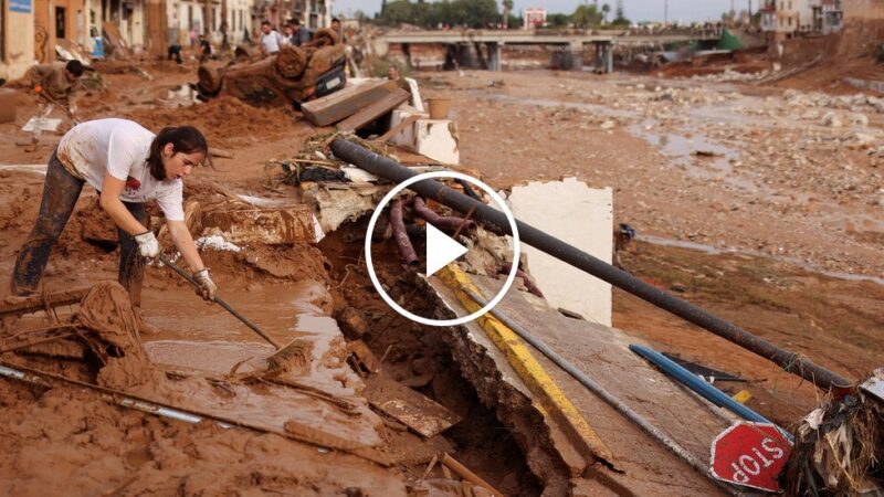 Volunteers Clean Up Debris After Unprecedented Flooding in Spain