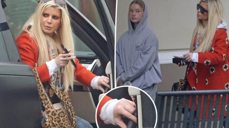 Jessica Simpson steps out without her wedding ring for movie outing with her kids amid Eric Johnson divorce rumors