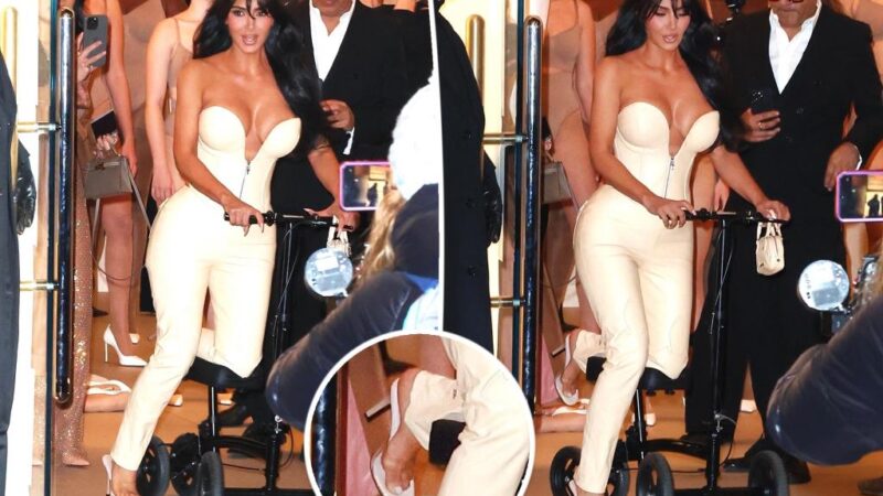 Kim Kardashian scoots on knee walker as she refuses to ditch heels with broken foot