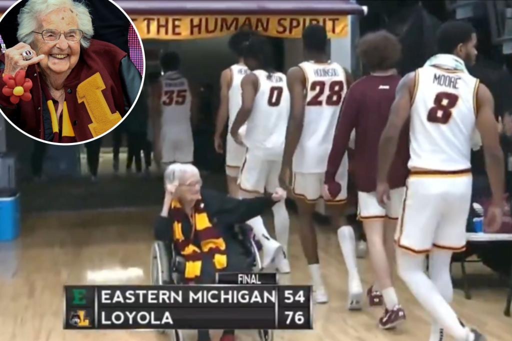 Loyola Chicago fan Sister Jean left hanging by players in viral clip