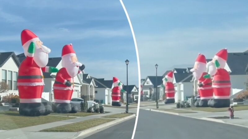 Stop the in-Santa-ty! Army of 50 inflatable Santas take over town (Video)