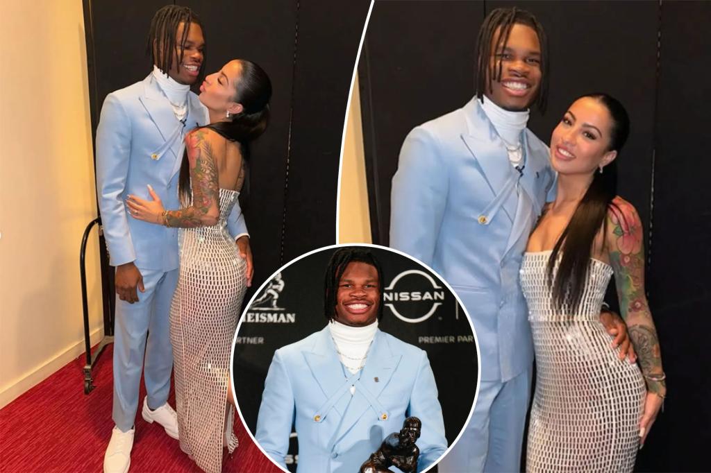 Travis Hunter, fiancée Leanna Lenee get cozy during Heisman Trophy win