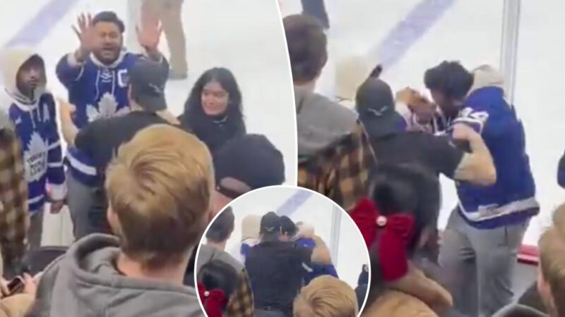 Philly fan swings away at Maple Leafs supporters in chaotic scene