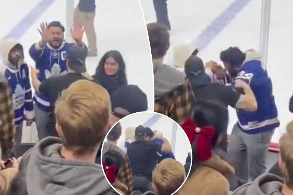 Philly fan swings away at Maple Leafs supporters in chaotic scene