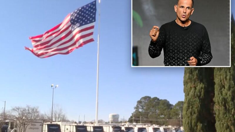 RV dealer racks up fines over giant American flag — but CEO and TV star says it’s not coming down