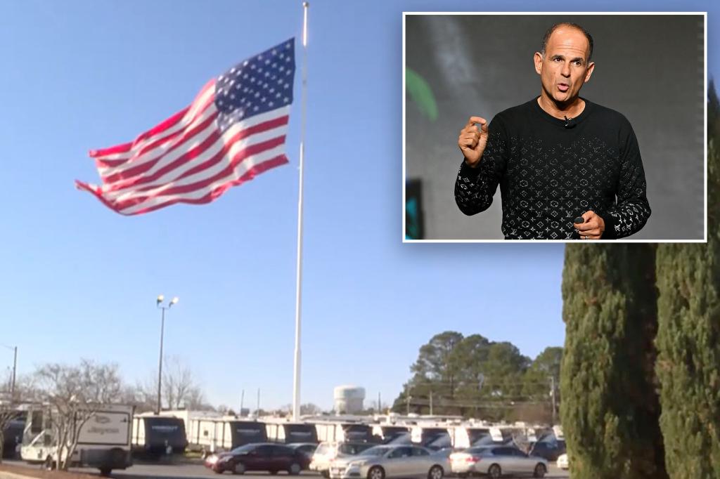 RV dealer racks up fines over giant American flag — but CEO and TV star says it’s not coming down