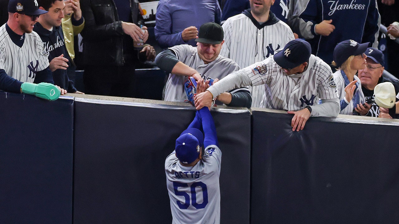 Yankees fans who interfered with Mookie Betts in World Series banned from MLB stadiums indefinitely: report