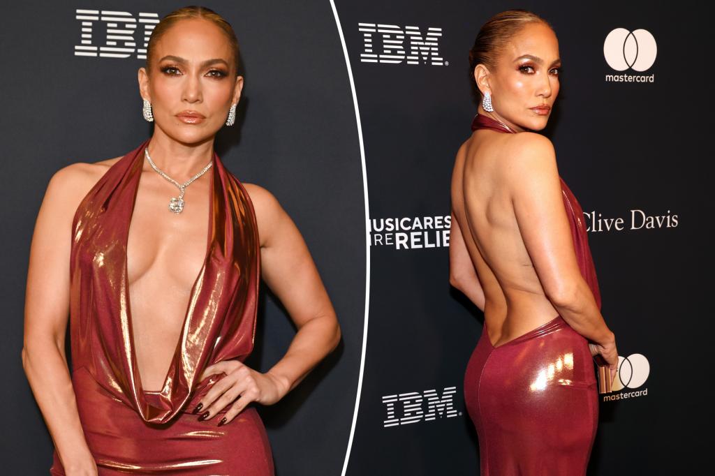 Jennifer Lopez shows off curves in skin-tight plunging halter gown at pre-Grammy party