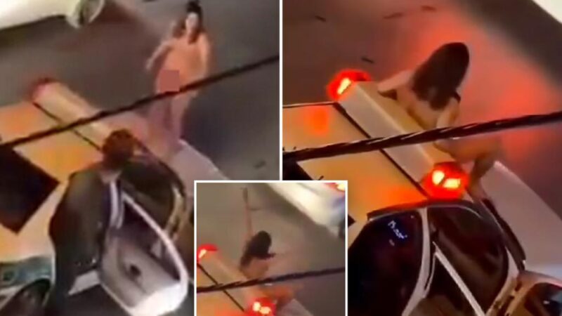 Video shows naked Iranian woman jumping on police car in protest at country’s treatment of women