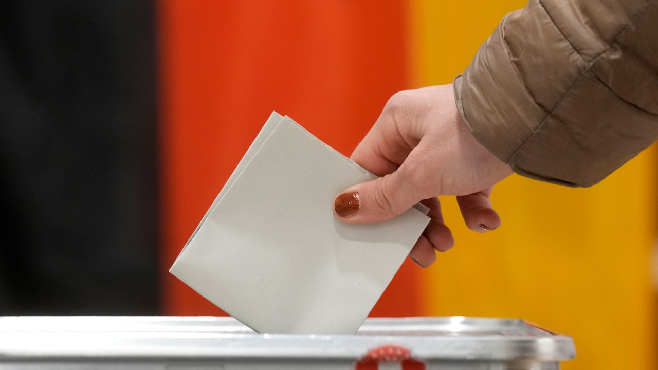 German election exit polls suggest conservative candidate pulling ahead