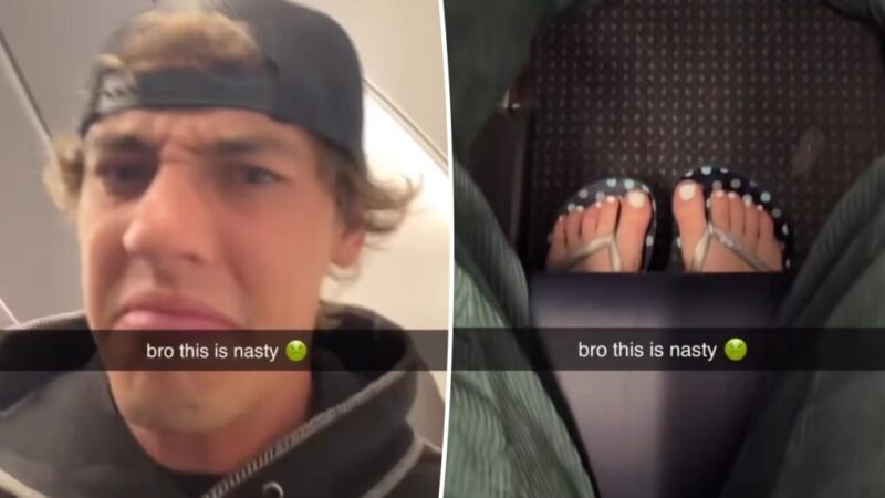 Plane passenger who won’t move feet gets ‘instant karma’: video