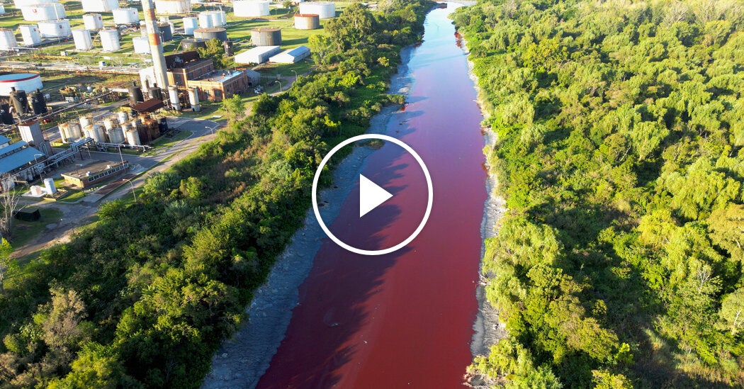 Stream Near Argentina’s Capital Turns Red