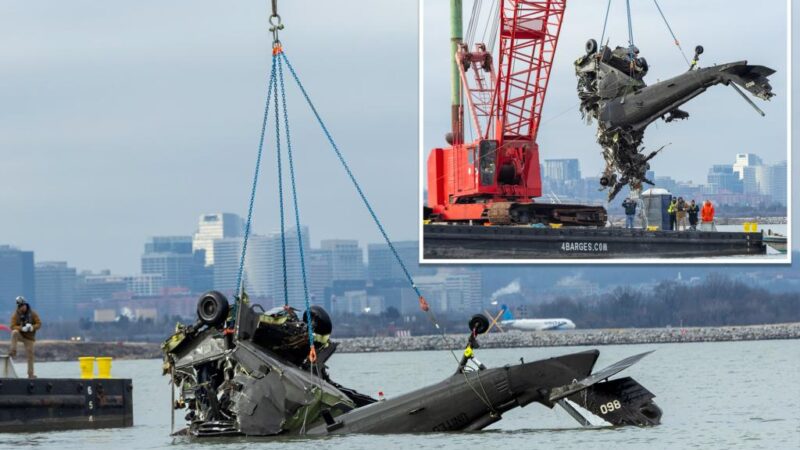 Mangled remains of downed Black Hawk helicopter pulled from the Potomac River after DC crash: NTSB