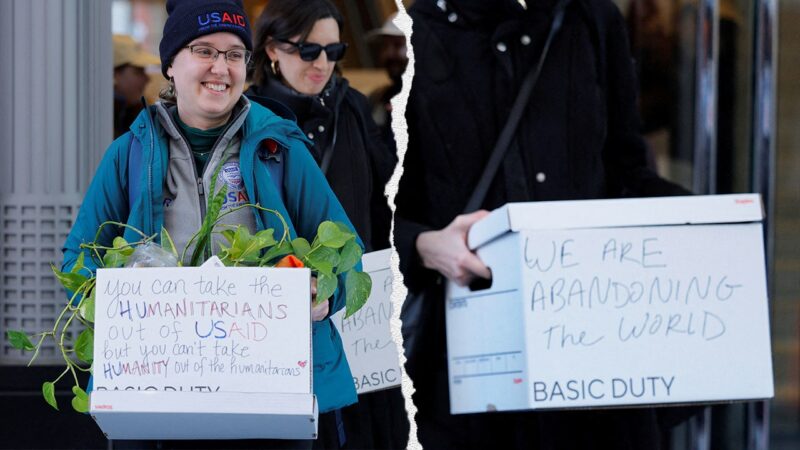 Fired USAID workers send message to Trump on boxes while leaving office for last time